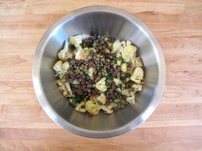 Chopped olives combined with roasted cauliflower.
