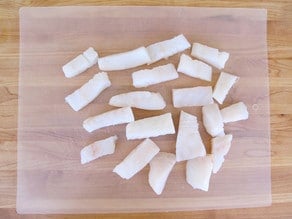 Fish cut into small pieces.