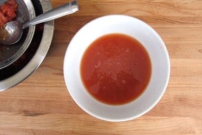 Tomato juice in a bowl.
