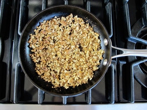 Dry toasting chopped nuts.