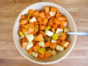 Root vegetables in a mixing bowl.