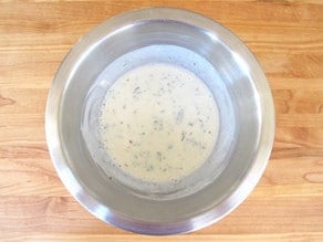 Yogurt sauce in a small bowl.