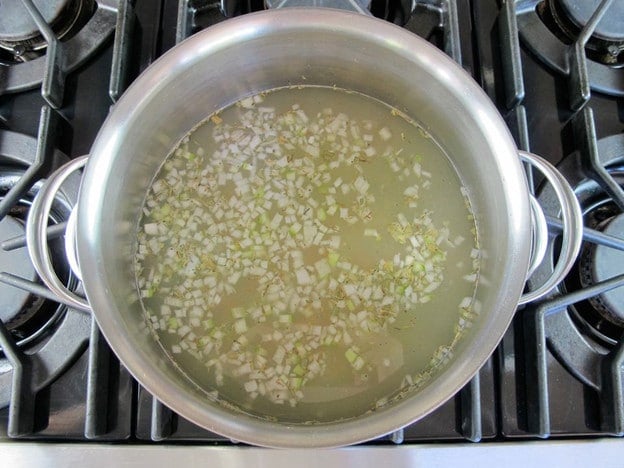 Cooking split peas in a stockpot.