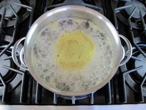 Cooking split peas in a stockpot.