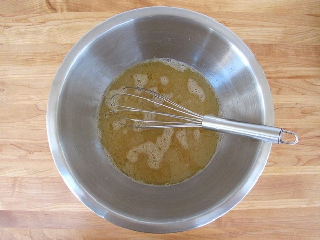 Egg and oil added to yeast.