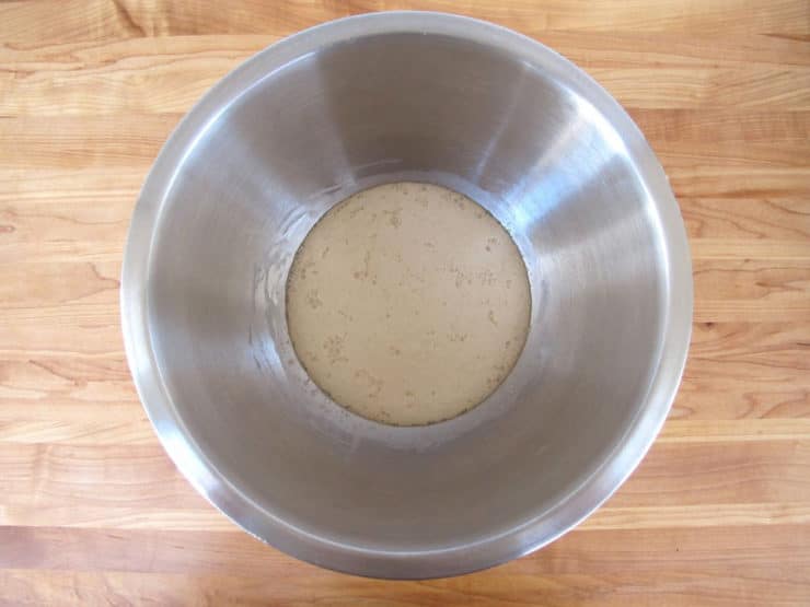 Yeast proofing in a small bowl.