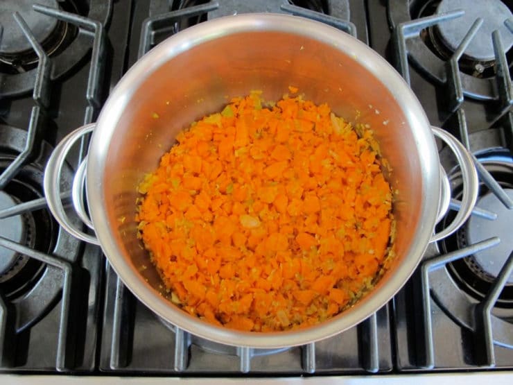 Carrots added to stockpot.
