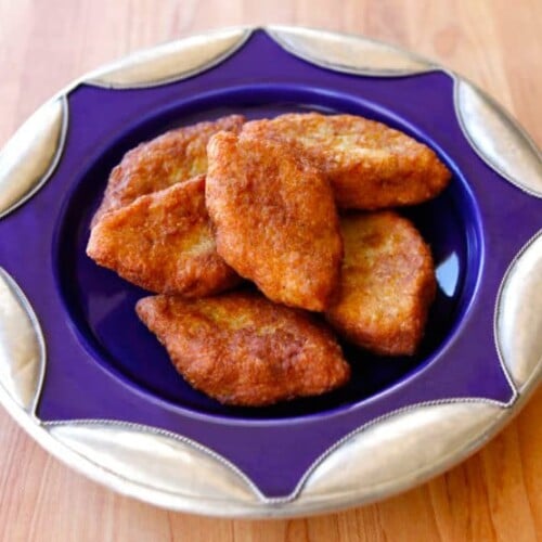 Delicious Keftes de Prassa, fried chicken on table