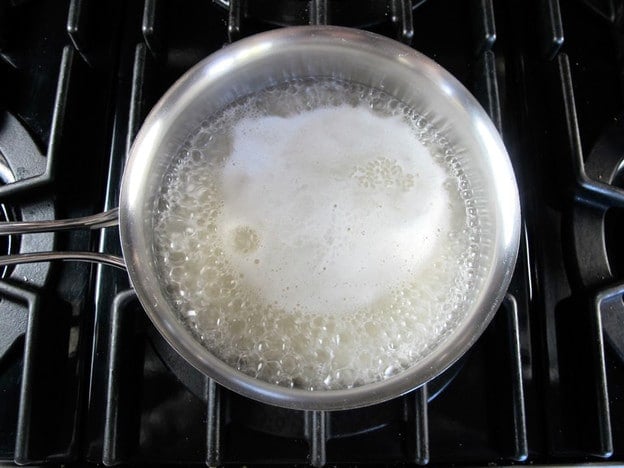Cooking rice in a saucepan.