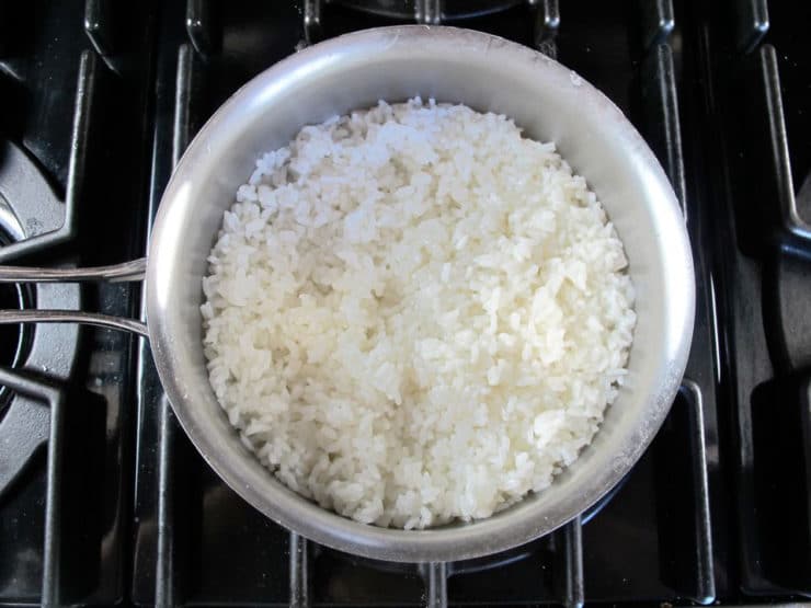 Cooking rice in a saucepan.