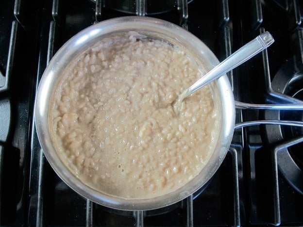 Tempering an egg into coconut milk.