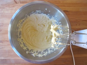 Beating butter into sugar for icing.