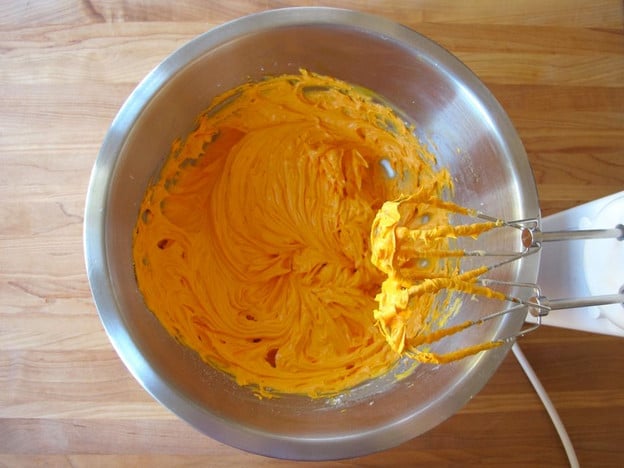 Beating color into icing.