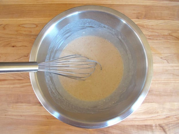 Seltzer and flour in a mixing bowl.