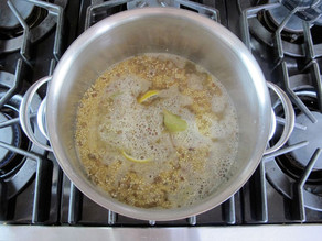 Cooking quinoa in a stockpot.