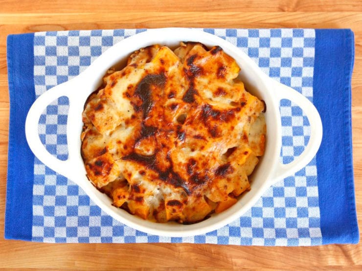 Roasted Butternut Squash Gratin with Gruyère and Walnuts - Sweet roasted butternut squash in gruyere cheese sauce with crunchy toasted walnuts, baked and broiled into a gratin. Kosher, Dairy