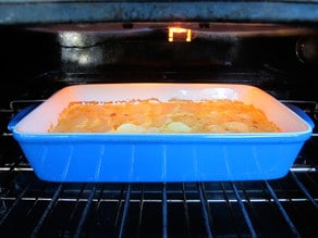 Scalloped potatoes in the oven.