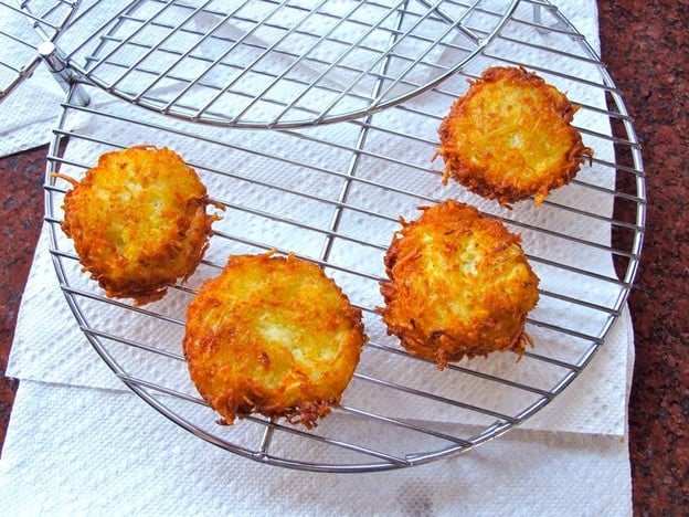 Fried latkes draining.