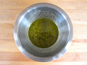 A bowl filled with pesto paste