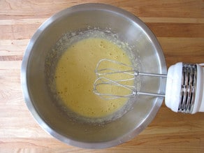 Eggs beaten into butter and sugar.