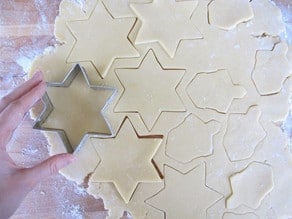 Cutting out sugar cookies.