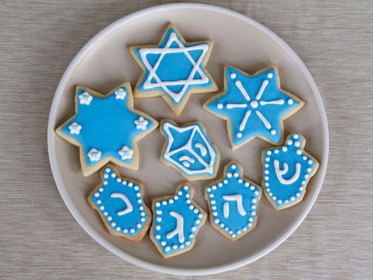 Plate of decorated iced Hanukkah holiday sugar cookies.