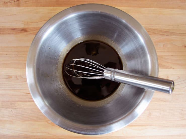 Balsamic dressing in a small bowl.
