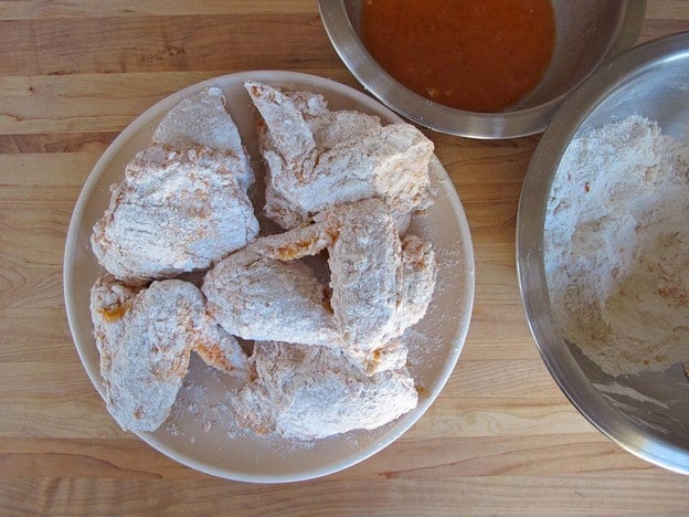 Chicken parts battered and breaded.