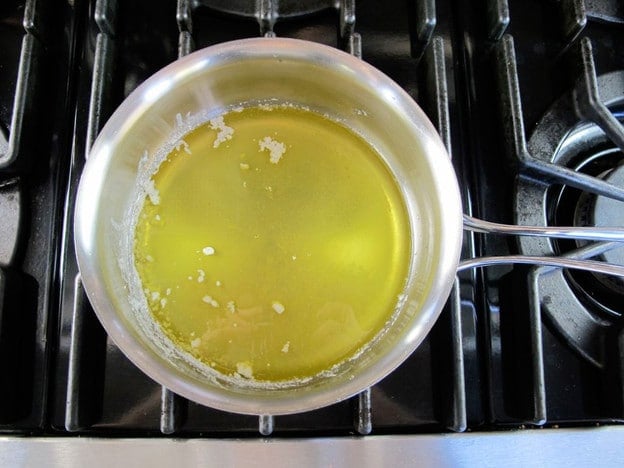Melted butter in a saucepan.