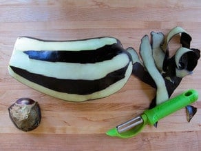 Peeling an eggplant.