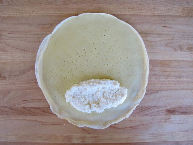 Cheese filling on a blintz wrapper.