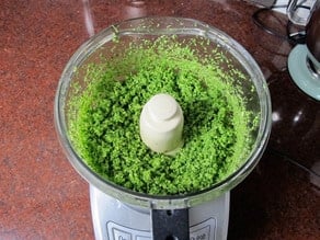 Broccoli chopped in a food processor.