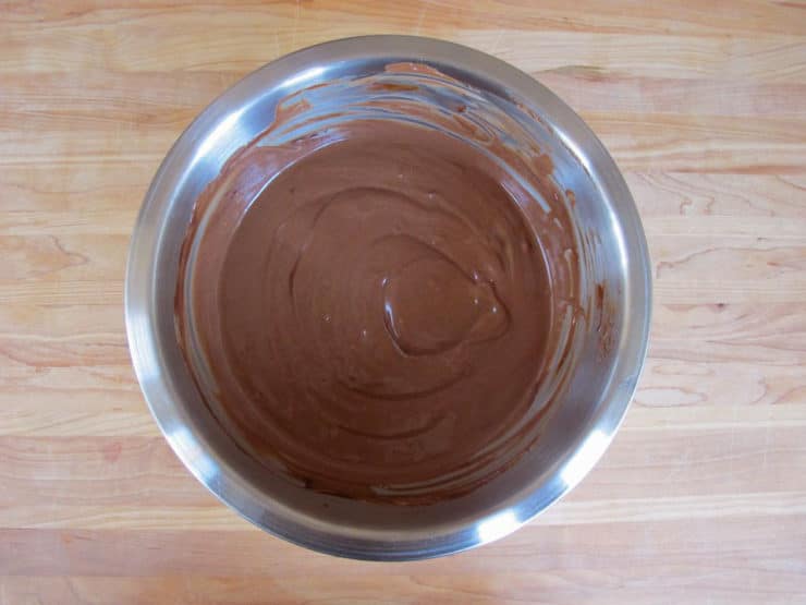 Mixing chocolate into Greek yogurt.