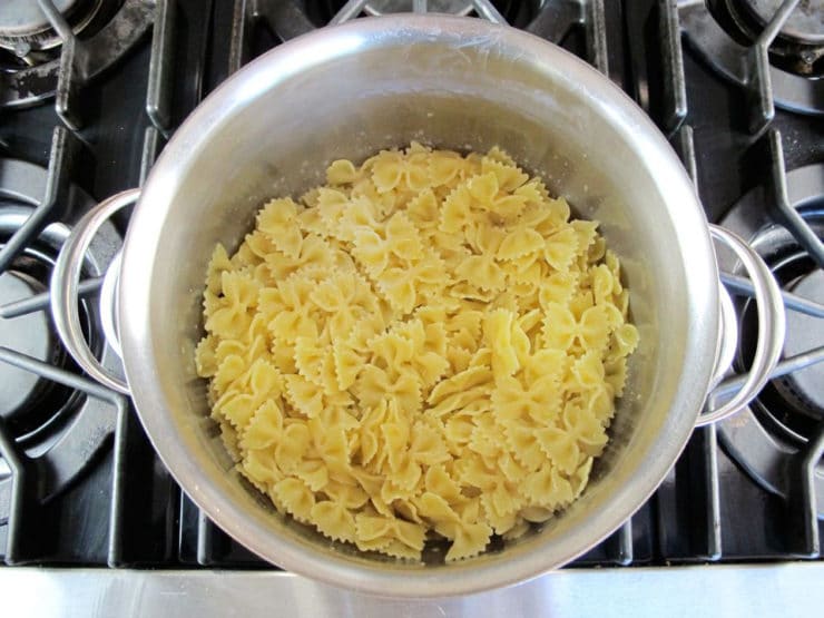 Buttered pasta in a stockpot.