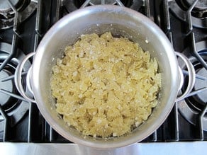 Cheese stirred into hot noodles.