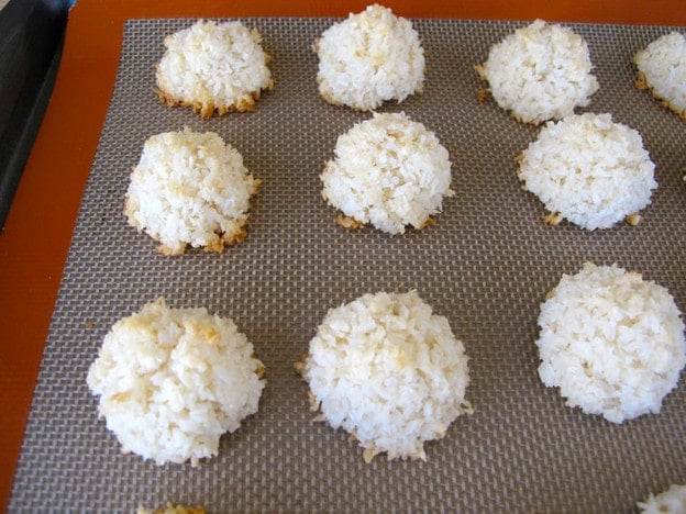 Baked macaroons on a baking sheet.