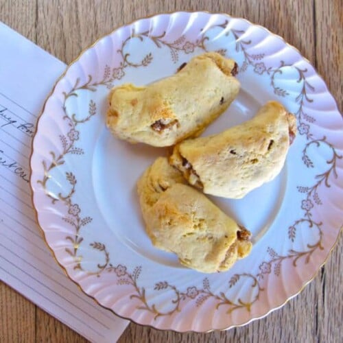 Three Unorthodox Rugelach served on a fancy plate with the recipe on the side