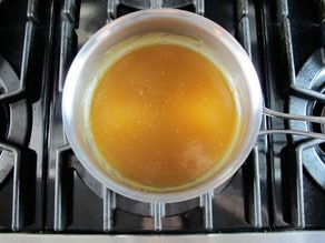 Turning pan drippings into gravy.
