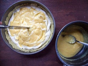 Marbling lemon curd into cheesecake filling.