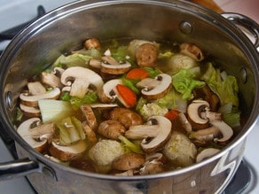 Nabe simmering in a stockpot.