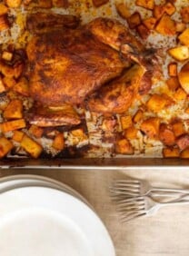 Weeknight Roast Chicken with Potatoes from David Leite - Recipe for roast chicken with red pepper paste and roasted potatoes. A great dish for your family any night of the week. Kosher for Passover.