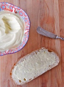 Homemade Spreadable Butter - Learn to make a healthier butter blend with grapeseed oil and salt. Spreadable when cold, lower in cholesterol and saturated fat.