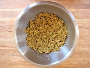 Panko combined with chickpea mixture in a mixing bowl.