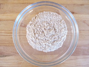 Processed almond meal in a bowl.