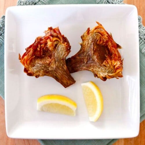 Jewish Fried Artichokes - Recipe and step-by-step photo tutorial for crispy and savory Jewish Fried Artichokes. Includes steps for cleaning and prepping artichokes.