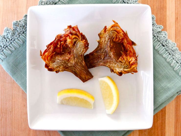 Jewish Fried Artichokes - Recipe and step-by-step photo tutorial for crispy and savory Jewish Fried Artichokes. Includes steps for cleaning and prepping artichokes.