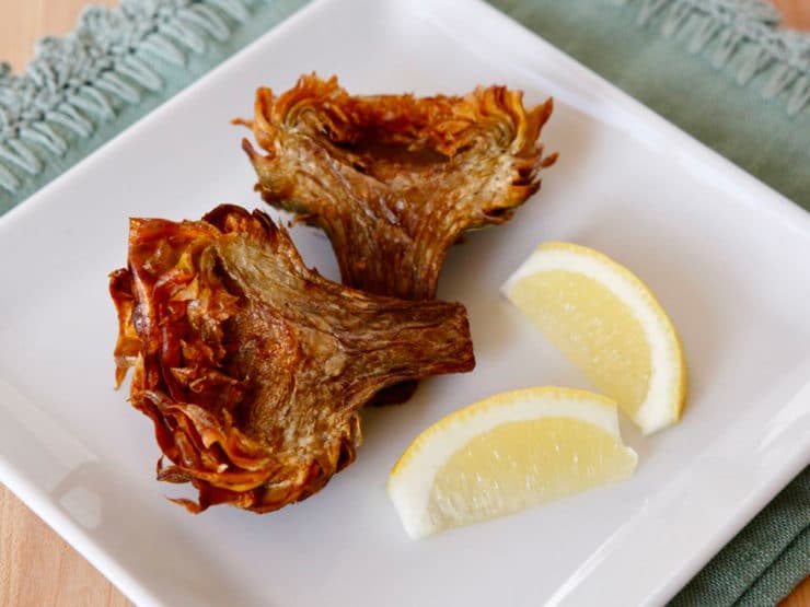 Jewish Fried Artichokes - Recipe and step-by-step photo tutorial for crispy and savory Jewish Fried Artichokes. Includes steps for cleaning and prepping artichokes.