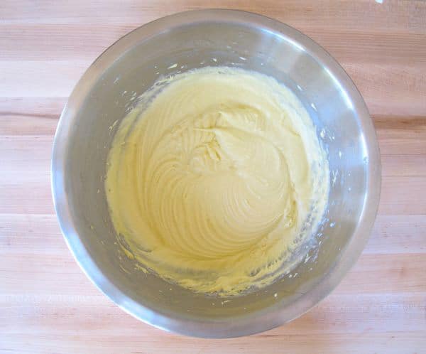 Flour whipped into butter in a bowl.