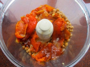 Roasted red peppers in a food processor.