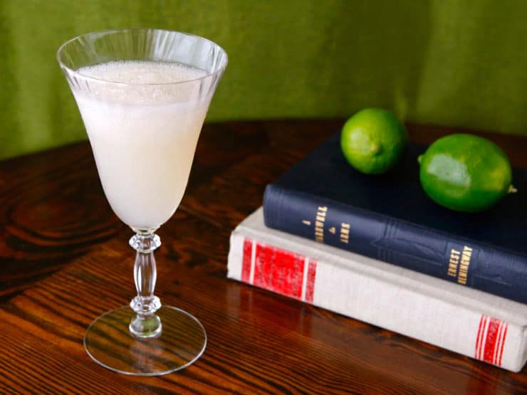 A classic Hemingway Special Daiquiri cocktail in a chilled glass with a lime wedge garnish